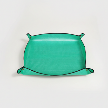 Green fabric pouch on a white background